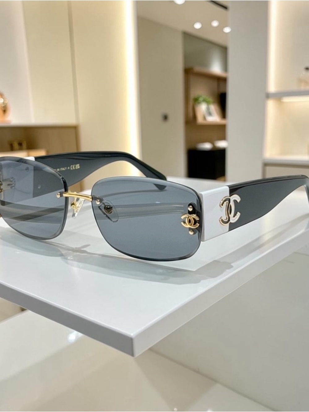 CHANEL Black and White Rectangular Sunglasses with Grey Lenses